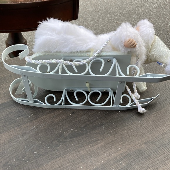 Snowy Porcelain Baby on a Sleigh - Picture 6 of 6